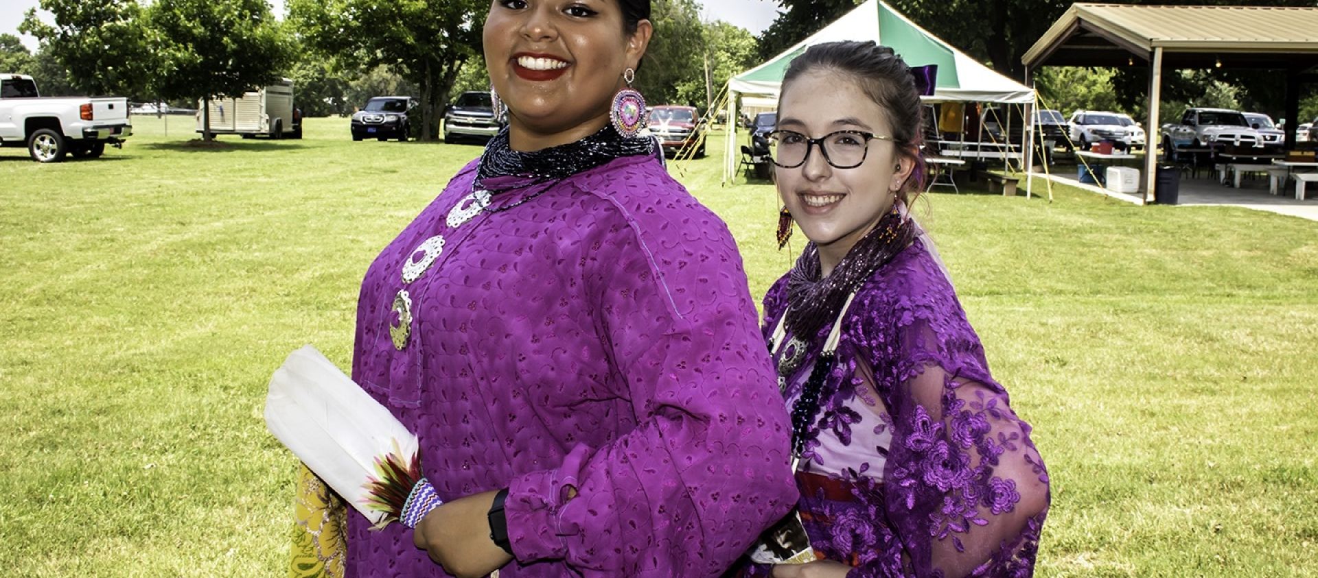 Young Wahzhazhe women pose for a photo before the Pawhuska Inlonshka (2021). 