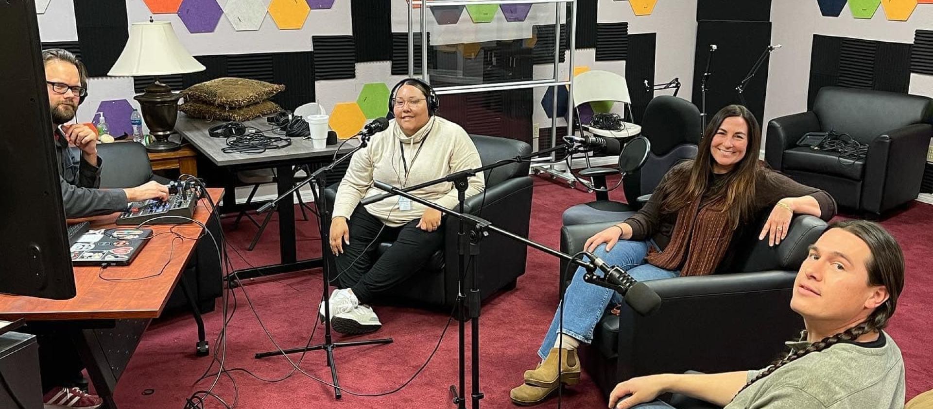 Language Teacher Celena Noear chats with podcast hosts Tom Ashmore and Abby Mashunkashey in the Osage Nation Language Department Audio Room. 