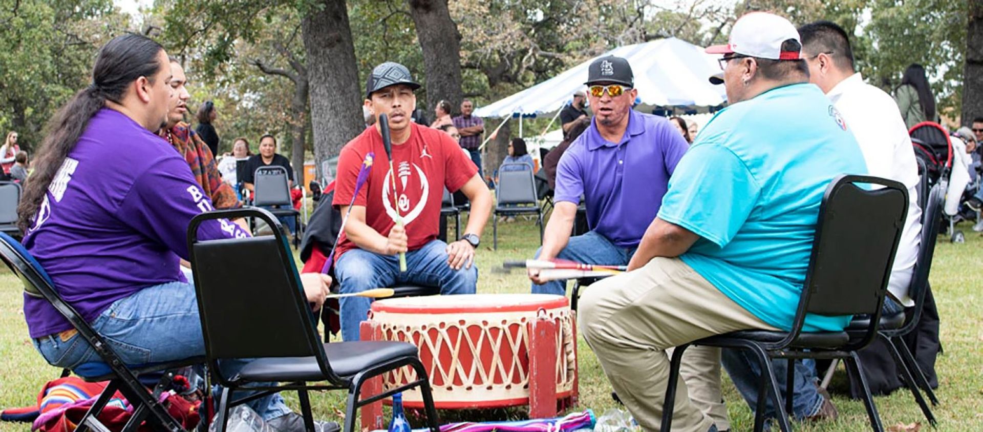 Wahzhazhe drummers and singers during an Osage Nation employee picnic and hand game (2019).