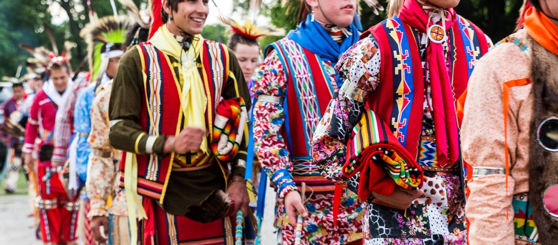 Grayhorse men in traditional clothing. 